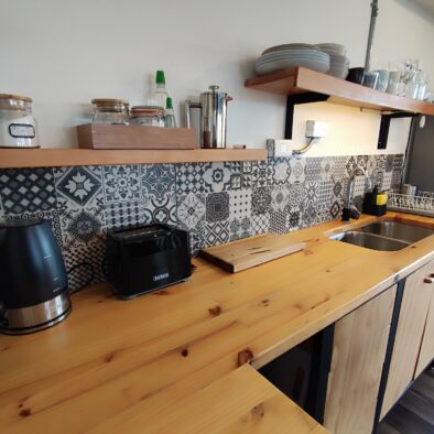 Fully equipped kitchen with sink at Casa Lenga vacation home