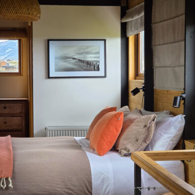 Master bedroom with double bed at Casa Lenga, Patagonia