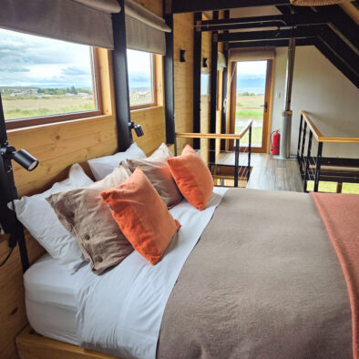 Comfortable bedroom with mountain views at Casa Lenga