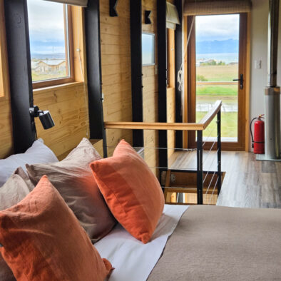 Cozy master bedroom with warm tones at Casa Lenga