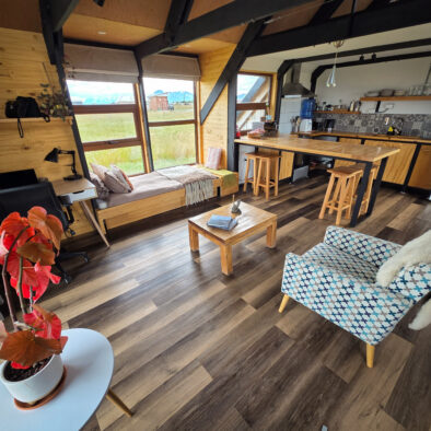 Living room and dining space at Casa Lenga, Puerto Natales