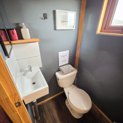 Half bathroom on second floor at Casa Lenga vacation rental, Puerto Natales